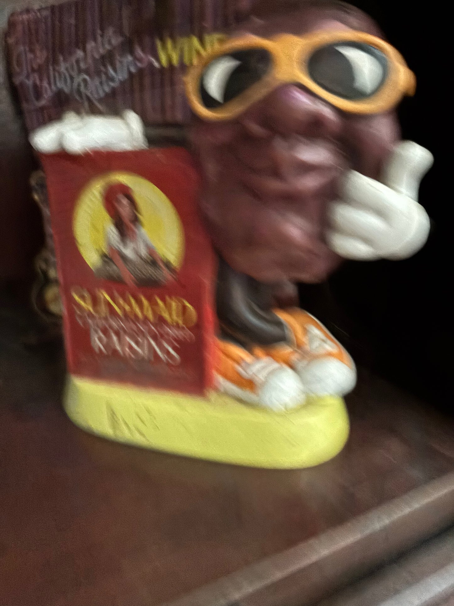 Raisins statue coin bank
